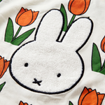Design detail on the Miffy in the Meadow tulip print bamboo lounge set